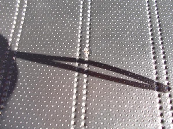 Brandfleck Rücksitzbank